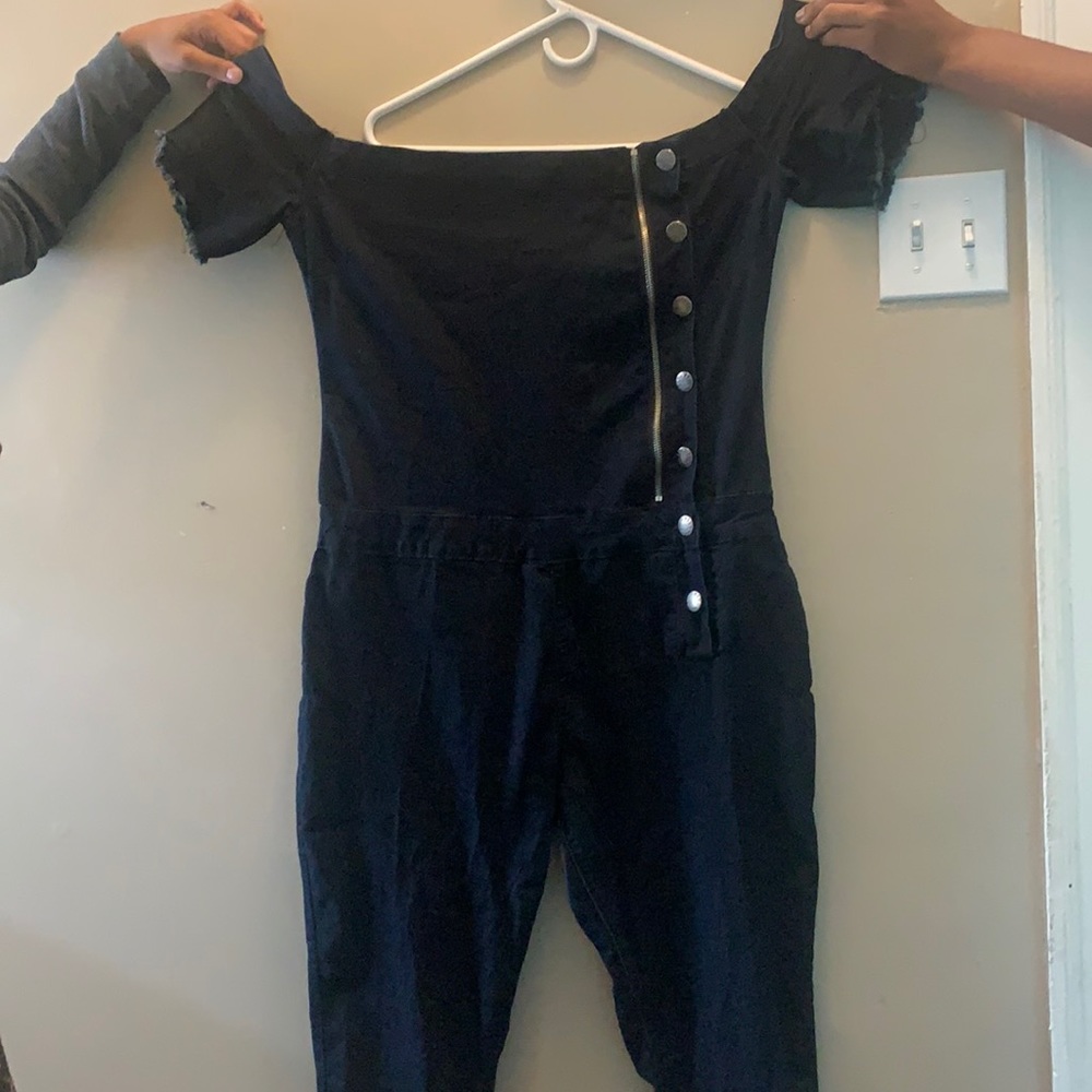 Denim jumpsuit with button up opening. Size 2X.